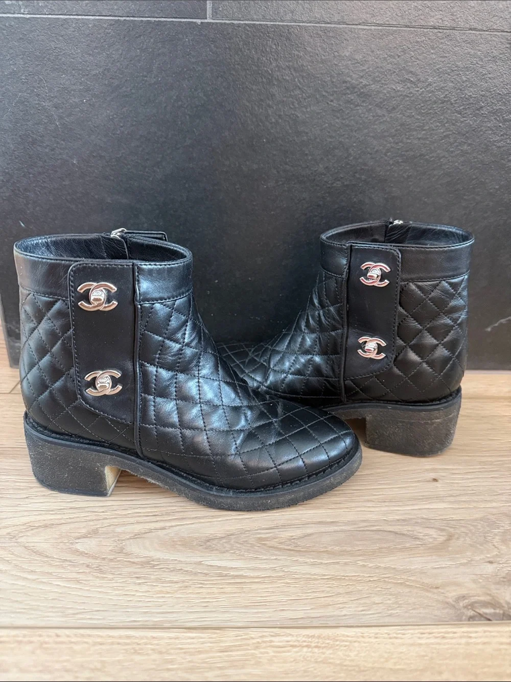 CHANEL Black Quilted Lambskin Ankle Boots with Silver CC Emblems